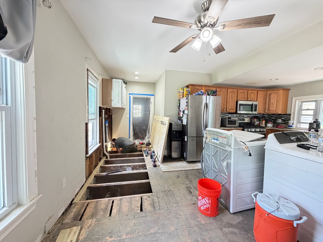 Water damage restoration work in a Massachusetts home